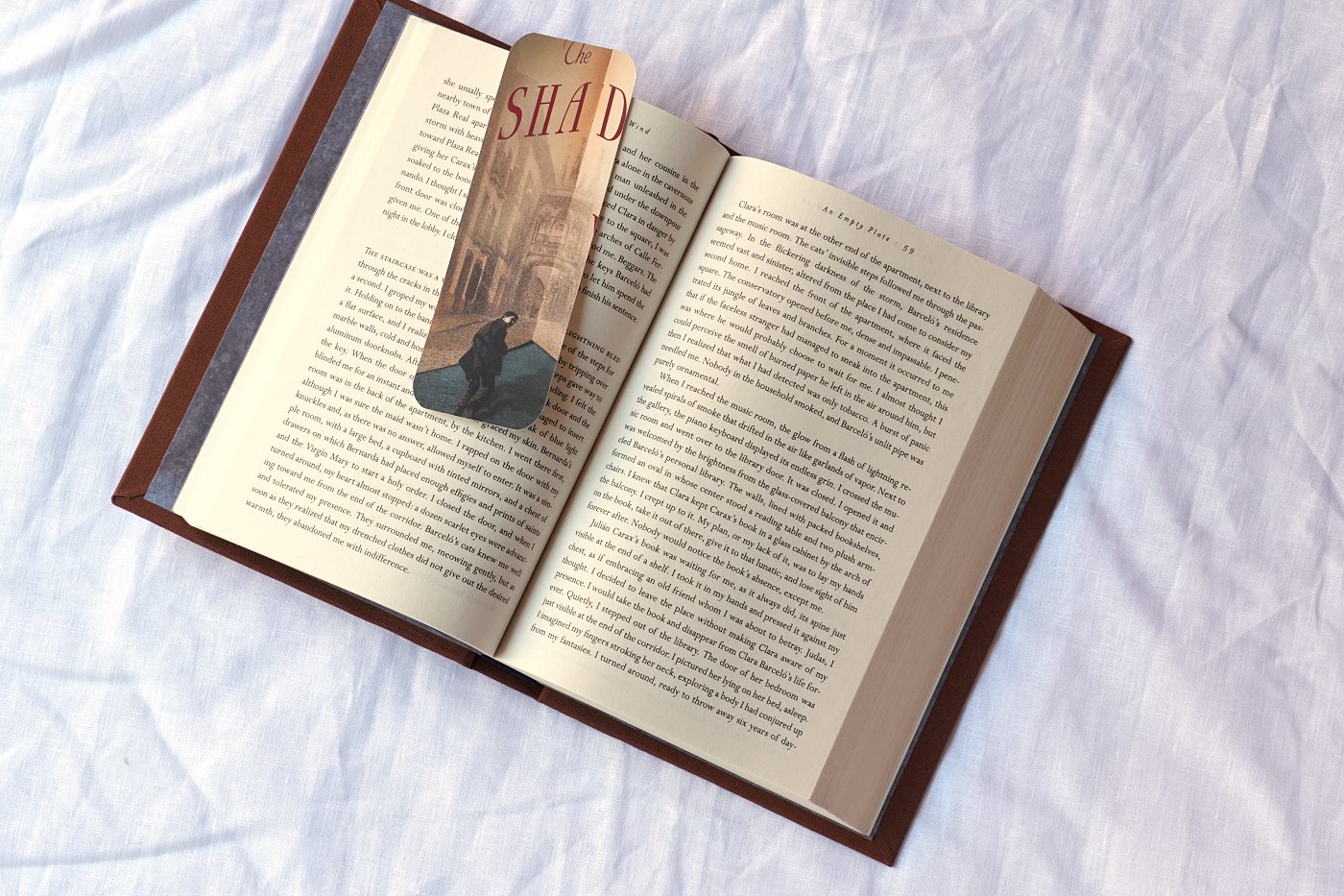 The book open with the bookmark cut from the original paperback cover